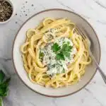 A bowl of high protein pasta with creamy cottage cheese sauce