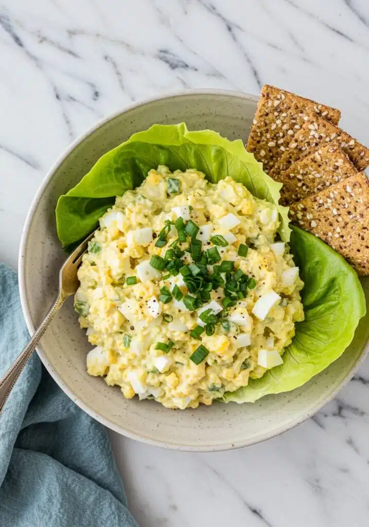 High-Protein Cottage Cheese Egg Salad served in lettuce cups with crackers