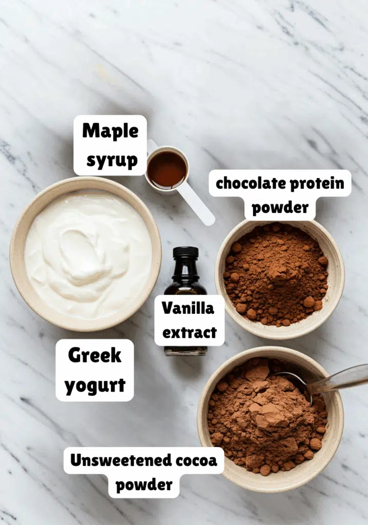 Greek yogurt, scoops of chocolate protein powder, unsweetened cocoa powder, vanilla extract, and maple syrup
