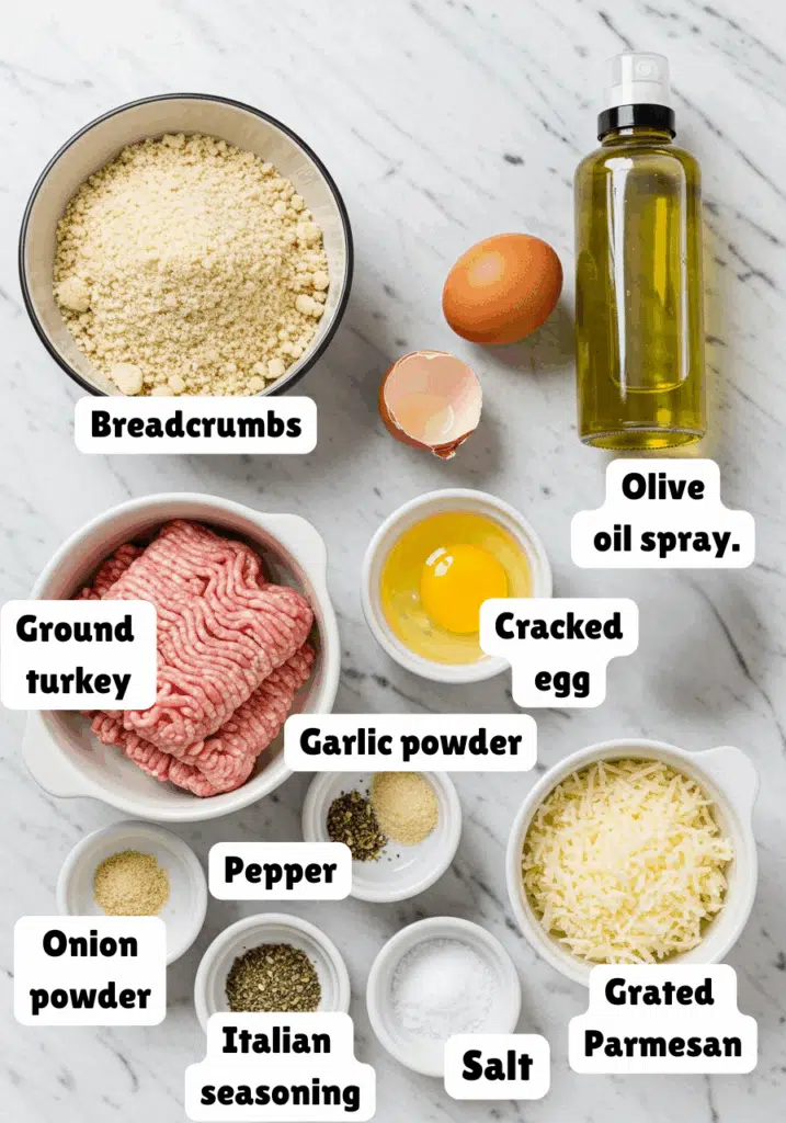 ingredients for turkey meatballs neatly arranged on a marble countertop